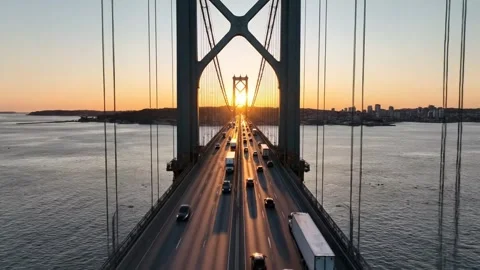 Sunset Over Bridge with Traffic Stock Footage 324807768