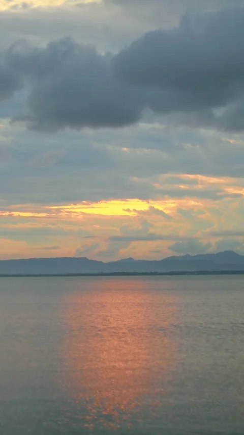Sunset Over a Calm Lake Landscape Stock Footage 311427059