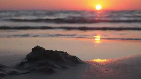 Sunset Over Calm Ocean Beach With Wet Sand Reflection Stock Footage 337419463