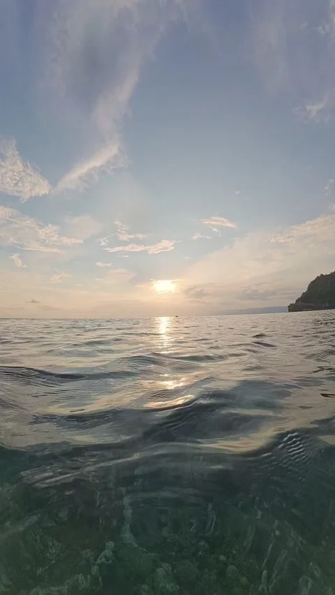 Sunset Over Calm Ocean Water Stock Footage 333838397