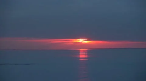 Sunset over calm sea Vídeo Stock 51127112