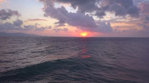 Sunset over the calm sea Stock Footage 102930676