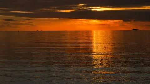 Sunset over the calm sea Stock Footage 133135867