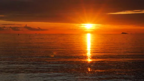 Sunset over the calm sea Stock Footage 171858322