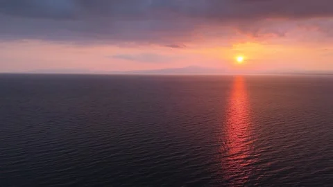 Sunset Over Calm Sea With Long Orange Reflection Stock-Footage 330636016