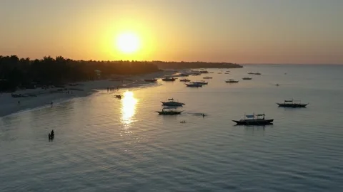 Sunset over calm tropical bay with boats, Philippines Stock Footage 325217618