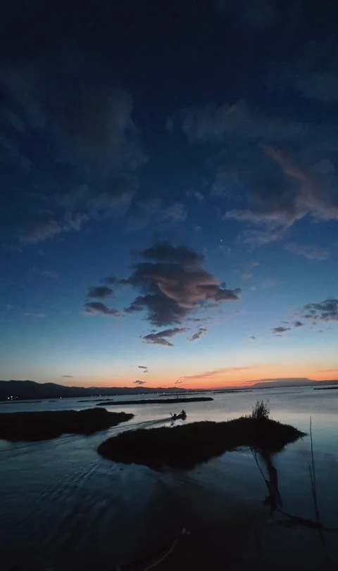 Sunset Over Calm Water with Islands Stock Footage 340334524