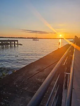 Sunset over calm waters Foto stock