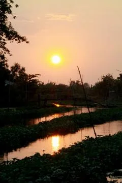 Sunset over canal Stock Photos