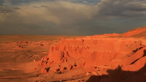 Sunset over the canyon Bayanzag in Mongolia Stock Footage 78499841