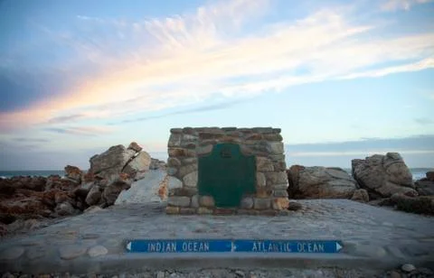 Sunset over Cape Agulhas marks the confluence of two oceans. Stock-Fotos