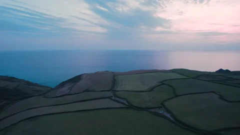 Sunset over Caunter Beach and Cliffs, Hartland Cornwall Heritage Coast, SW Coast 動画素材 201829480