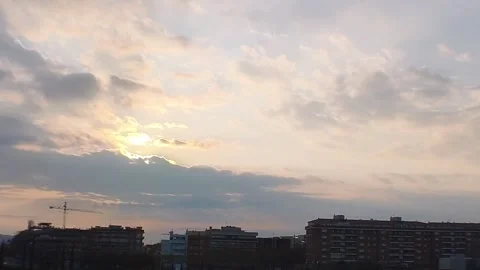 Sunset Over City with Clouds Timelapse Video stock 331316312