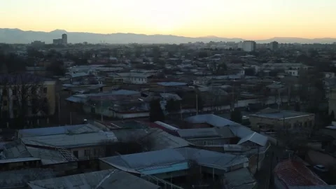 Sunset over the city. Cloudy summer evening. Stock Footage 258117642
