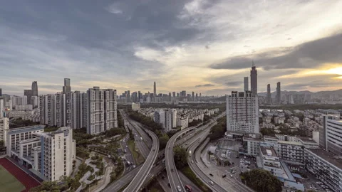 Sunset over the city elevated fast overpass Stock Footage 138785595