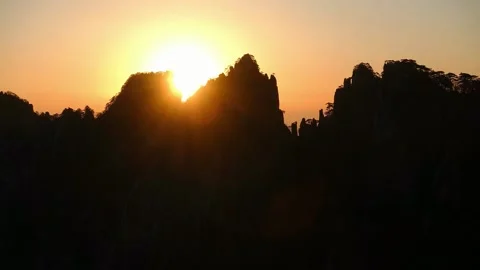 A sunset over a city Видео 156843639