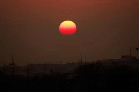 Sunset over the city Stock Photos