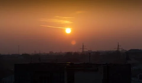 Sunset over the city Stock Photos
