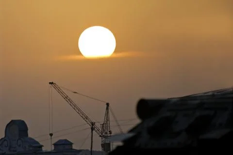 The sunset over the city Stock Photos