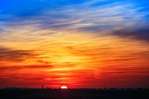 Sunset over city Stock Photos