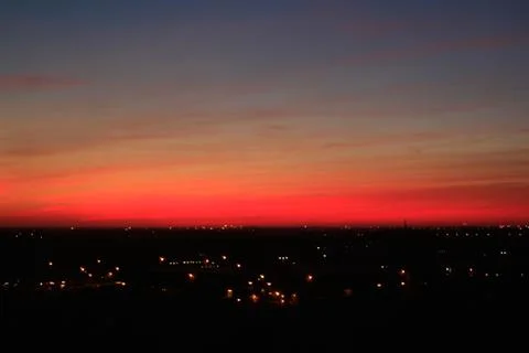 Sunset over the city Stock Photos