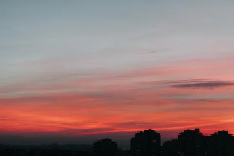 Sunset over the city Stock Photos