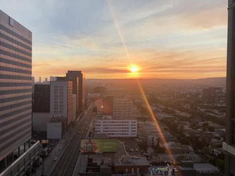 Sunset over city Stock Photos