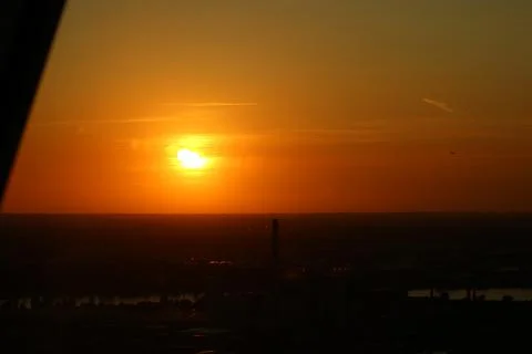 Sunset over the city Stock Photos