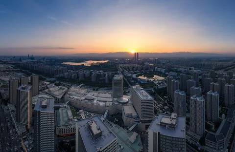 Sunset over the city Stock Photos