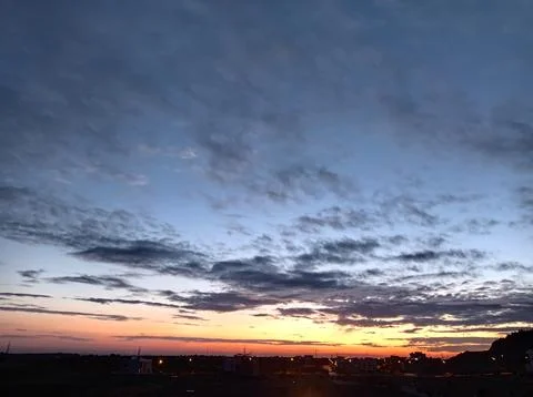 Sunset over the city Stock Photos