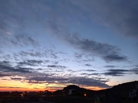 Sunset over the city Stock Photos