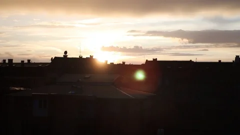 Sunset Over City Roofs Stock Footage 108630989