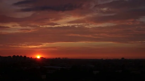 Sunset over city skyline with speed up Video stock 77101454