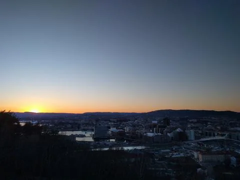 Sunset over the city in the spring Stock Photos