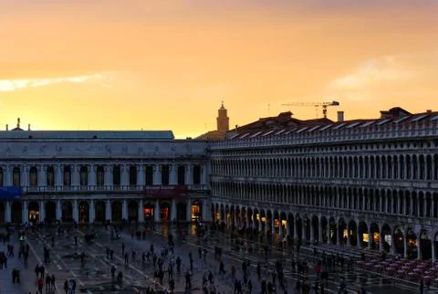 Sunset over city square Stock Photos