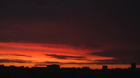 Sunset over city static timelapse. Dramatic cloudy sky, beautiful nature Stock Footage 251730308