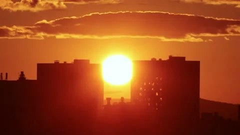 Sunset over a city time lapse Stock Footage 141125038