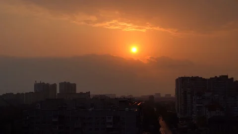 Sunset over the city, top view . Shooting in 4K Stock Footage 128552273
