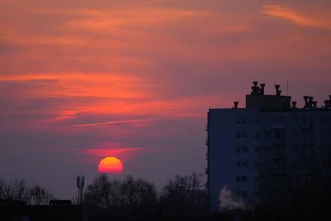 Sunset over the cityscape in winter Stock Photos