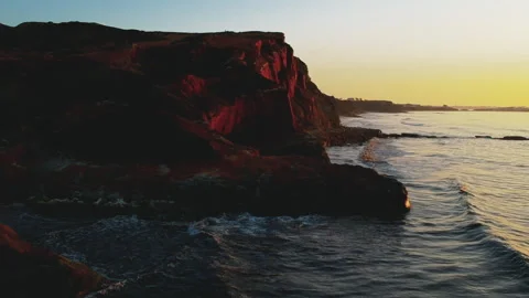 Sunset over Cliffs and Ocean, Almagreira Ferrel Portugal Video stock 315298139