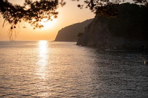 Sunset Over Cliffs and Sea Stock Photos