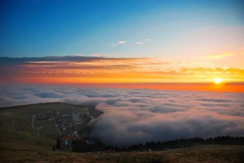 Sunset over clouds Foto stock
