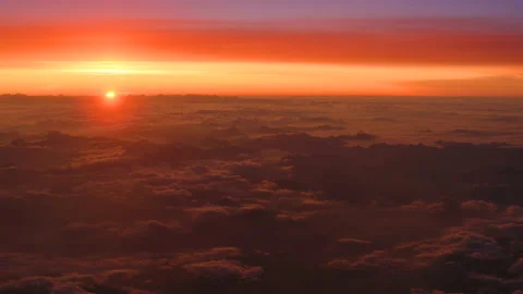 Sunset over cloudscape viewed from the aircraft Stock-Footage 124755712