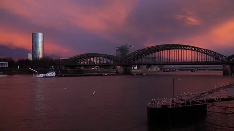 Sunset over the Cologne Skyline Triangle Tower Crowd Pass Bridge Tourists Travel Stock Footage 87824582