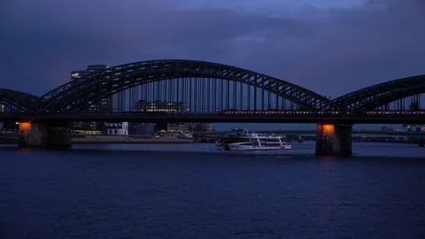 Sunset over the Cologne Skyline Triangle Tower Crowd Pass Bridge Tourists Travel Stock Footage 87826121