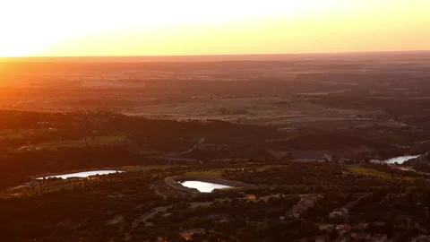 Sunset over the countryside and small reservoirs in the province of Segovia Stock Footage 247085164
