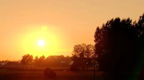 Sunset over the countryside Stock Footage 8666571