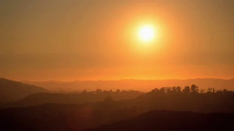 Sunset over countryside Stock Footage 82830227
