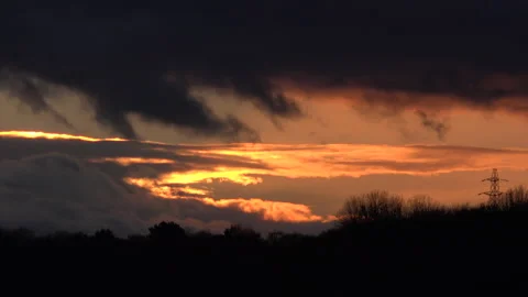 Sunset over countryside time lapse in England UK 4K Stock Footage 147985476