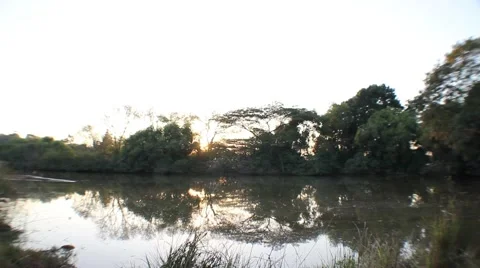 Sunset over a dam time lapse Stock Footage 51755691